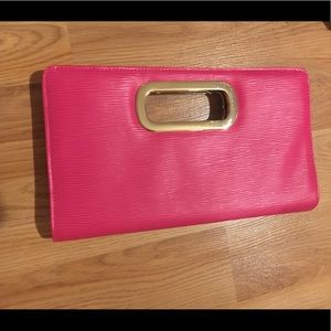 Hot pink clutch with gold hardware
